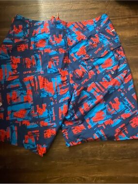 Under Armour Paint-Splatter Swim Trunks in Navy, Red & Teal